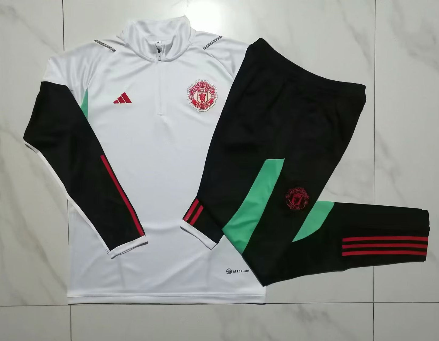 MANCHESTER UNITED CONJUNTO ENTRENAMIENTO II 23/24 HOMBRE