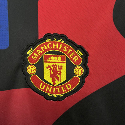 CAMISETA PRE-PARTIDO MANCHESTER UNITED 2024/25
